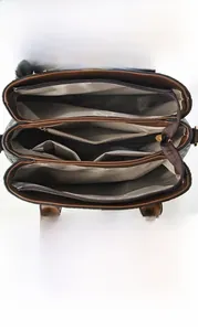 Detailed view of the multi-compartment interior and spacious capacity of the woven tote bag