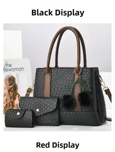 Three-piece black embossed tote bag set with wallet and card holder on a clean background