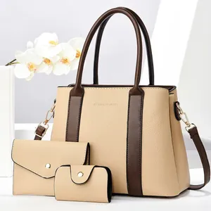 Three-piece beige and brown faux leather tote bag set with matching clutch and card holder
