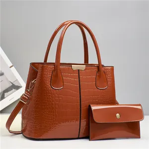 Brown crocodile embossed faux leather handbag set with gold hardware for women