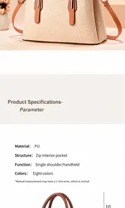 Detail van fijn stiksel en gouden hardware op een beige getextureerde PU-lederen handtas
