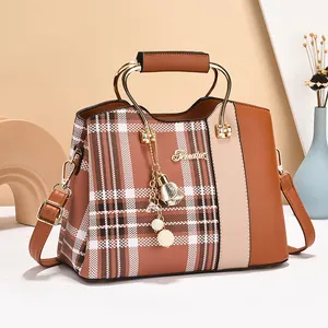 Plaid contrast color handbag for women with gold metal handles and pearl charm pendant