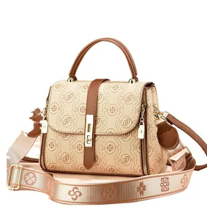 Sac à main rétro monogramme pour femme avec garniture en cuir brun et large bandoulière
