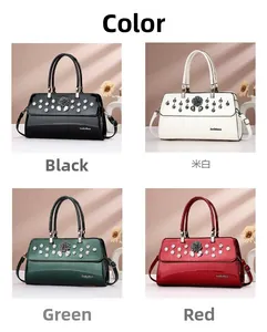 Detailed grid view of high-gloss patent leather handbags with rose and rhinestone accents