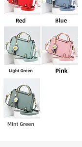 Macro detail of multi-color women handbags with daisy charms and metal handles