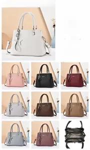 Detailed grid showing multi-color PU leather handbags with dimensions and internal compartments
