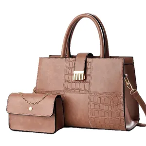 Brown crocodile embossed tote bag set with matching chain strap crossbody handbag