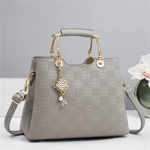 Elegant grey plaid embossed handbag with golden arch handle and pearl knot pendant