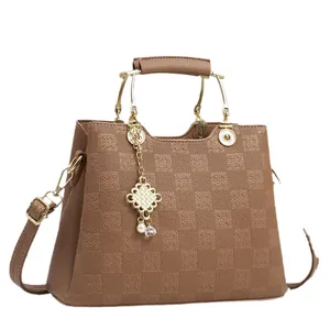 Brown checkered embossed handbag with lychee leather and pearl pendant decoration