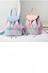 Detail of floral gradient leather backpack showing texture and adjustable straps