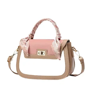 Pink and khaki patchwork handbag with paisley silk scarf handle and gold metal twist lock