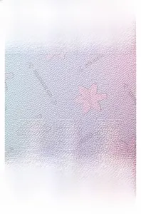 Detailed macro view of soft gradient faux leather with embossed star patterns