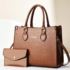Brown crocodile embossed tote bag set with matching wallet and golden metallic logo