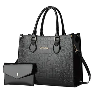 Large black crocodile pattern glossy patent leather tote bag with matching envelope purse