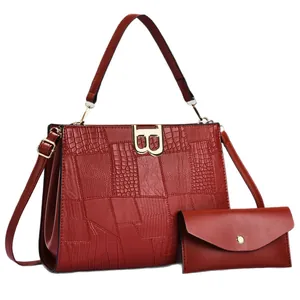 Red crocodile texture handbag set with golden B-buckle and matching envelope pouch