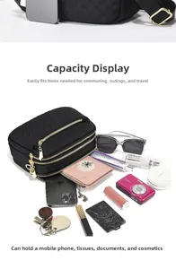 Detailed top view of the black quilted crossbody bag showing large storage capacity