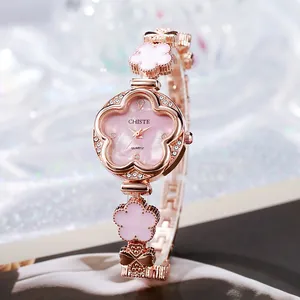Montre Bracelet à Quartz pour Femme en Forme de Fleur Incrustée de Strass Montre en Métal Or Rose pour Fête de Mariage Cadeau