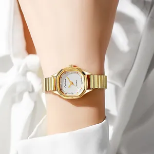 Elegant gold octagonal women's quartz watch with crystal indices and a stretch band