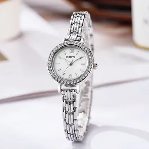 Elegant silver diamond-encrusted women watch with chain strap and mother of pearl dial