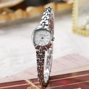 Elegant vintage silver chain quartz watch for women with polished links and textured dial