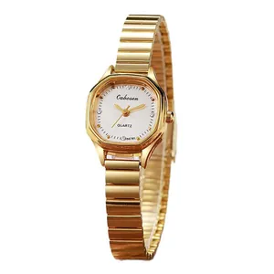 Elegant gold bathtub-shaped women's quartz watch with a flexible bamboo steel strap