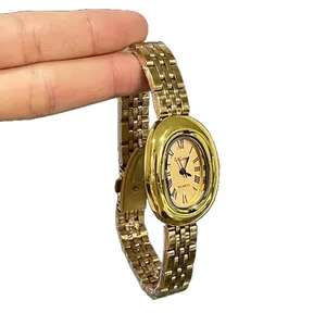 Elegant women's gold quartz watch with oval dial and Roman numerals on metal link strap