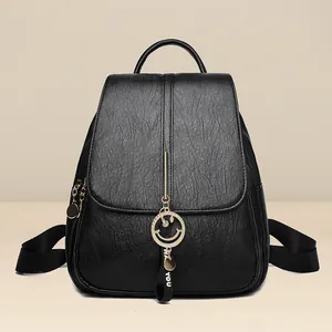 Black pebbled leather backpack for women with smiley face pendant and for you ribbon
