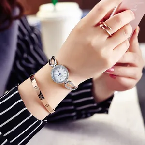 Elegant silver quartz watch for women with rhinestone dial and stylish metal bracelet band