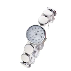 Elegante Damen Quarzuhr mit kristallbesetztem Zifferblatt und weißem Gliederarmband