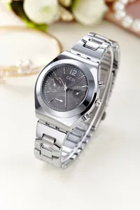 Detailed macro view of GEDI silver stainless steel watch with grey multifunctional dial