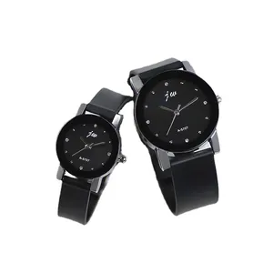 Minimalist black quartz couple watches with silicone straps and crystal accents