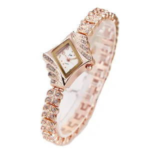 Rose gold quartz watch for women with rhinestone leaf-shaped bracelet and diamond dial