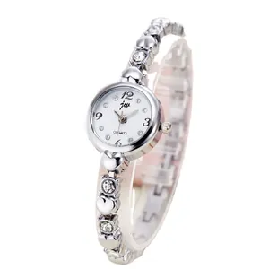 Elegant women's quartz watch with silver heart-shaped bracelet and rhinestone details