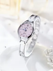 Detail of silver steel watch with pink dial and Roman numerals on white satin background