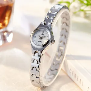 Elegant silver quartz watch for women with hollow link strap and diamond-accented dial