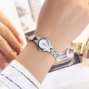 Elegant women's silver steel quartz watch with a minimalist oval dial and H-link bracelet