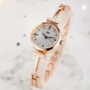 Elegant rose gold women's quartz watch featuring a sparkling silver dial and chain bracelet