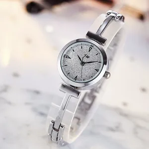Elegant silver quartz watch for women featuring a white resin strap and glitter dial