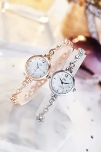 Détails de montres quartz or rose et argent avec bracelet métallique strass