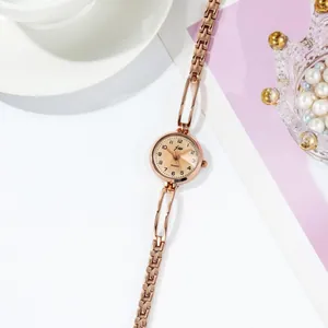 Elegant rose gold chain strap watch for women with round dial and vintage style