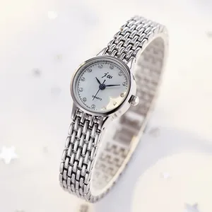 Elegant women's silver quartz watch with chain bracelet and crystal index on white dial