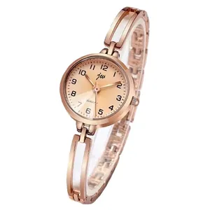 Elegant rose gold women's quartz watch with a slim hollow metal bracelet strap