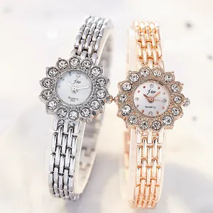 Luxury women's quartz watch with rhinestone flower dial and silver/rose gold mesh band