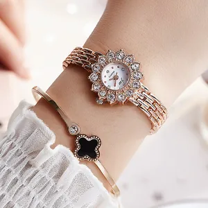 Elegant rose gold rhinestone women watch with radiant floral dial and link bracelet