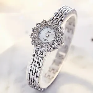 Luxury silver flower-shaped women's watch with crystal-encrusted dial and chain strap