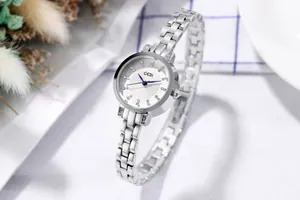 Detail of GEDI silver quartz watch with diamond markers and elegant blue steel hands