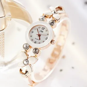 Montre Quartz Femme Mode Alliage Strass Fleur Papillon Design Élégante Montre Bracelet Bijoux pour Cadeau Femme