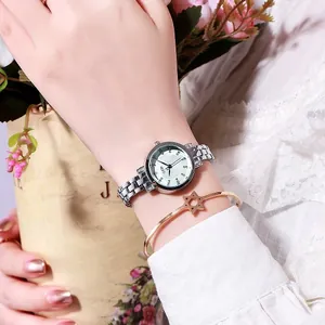 Stylish silver stainless steel ladies watch with rhinestone markers and rose gold star bracelet