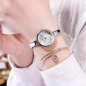 Elegant women's silver watch with starry sky dial and matching zircon charm bracelet set