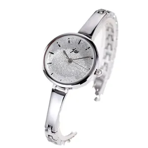 Elegant women's silver watch with a shimmering glitter dial and slim metal chain strap